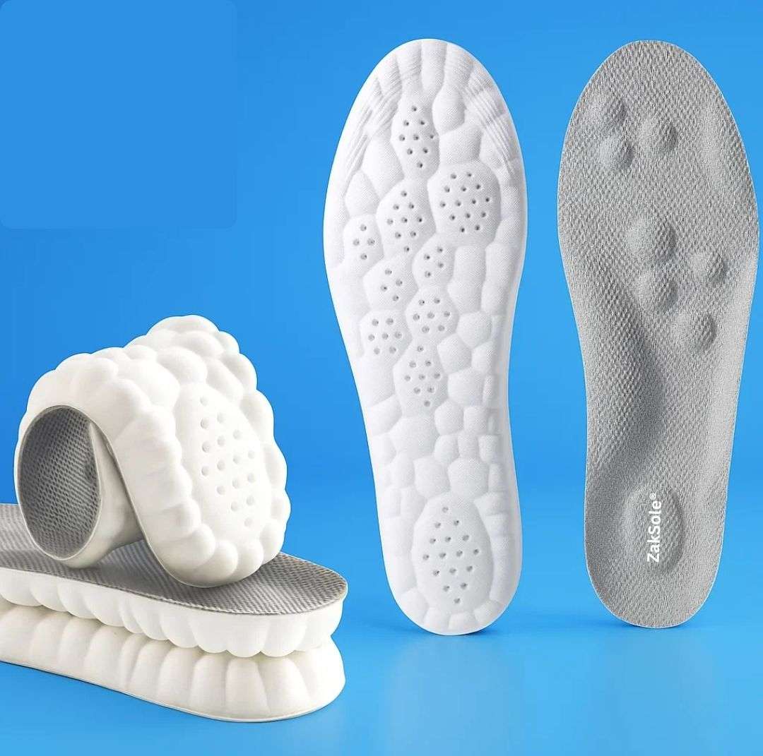White and gray shoe insoles on a blue background