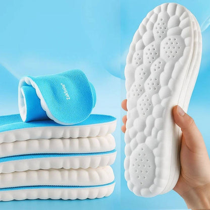 Stack of white insoles with a blue towel on a light blue background